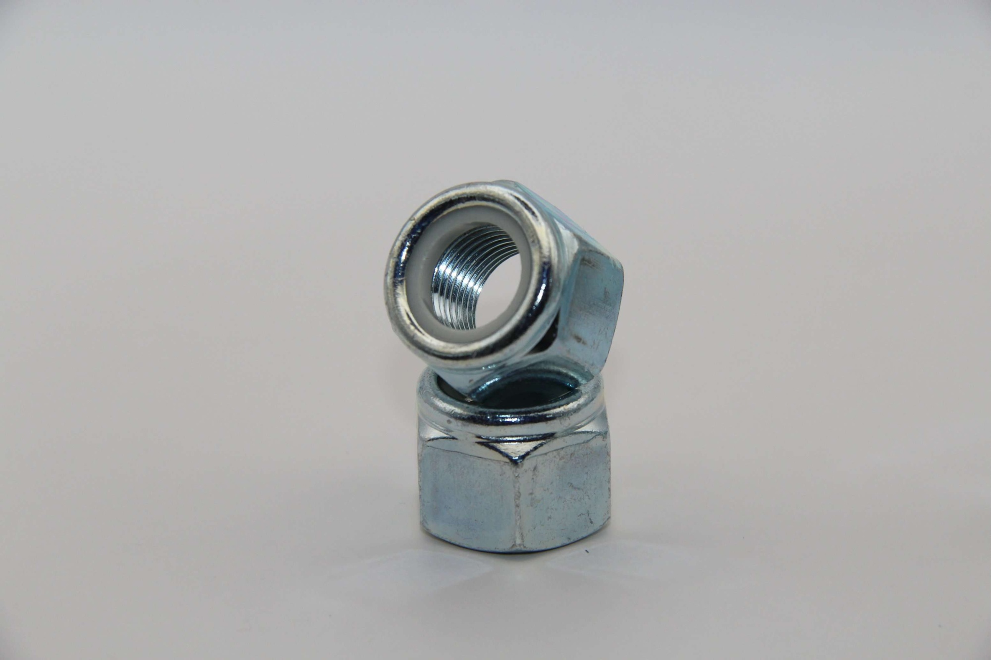 Комплект гаек 14х1,5 с белым нейлоновым кольцом самоконтрящихся высоких цинк 5 шт